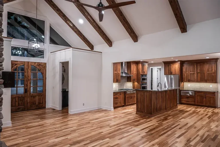 Vaulted kitchen with wood beams - Cole Construction custom home