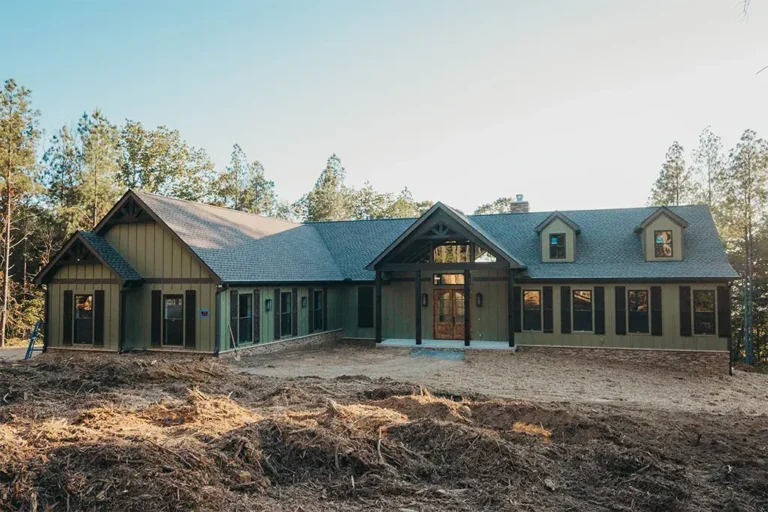 Custom home exterior at dusk - Cole Construction custom home